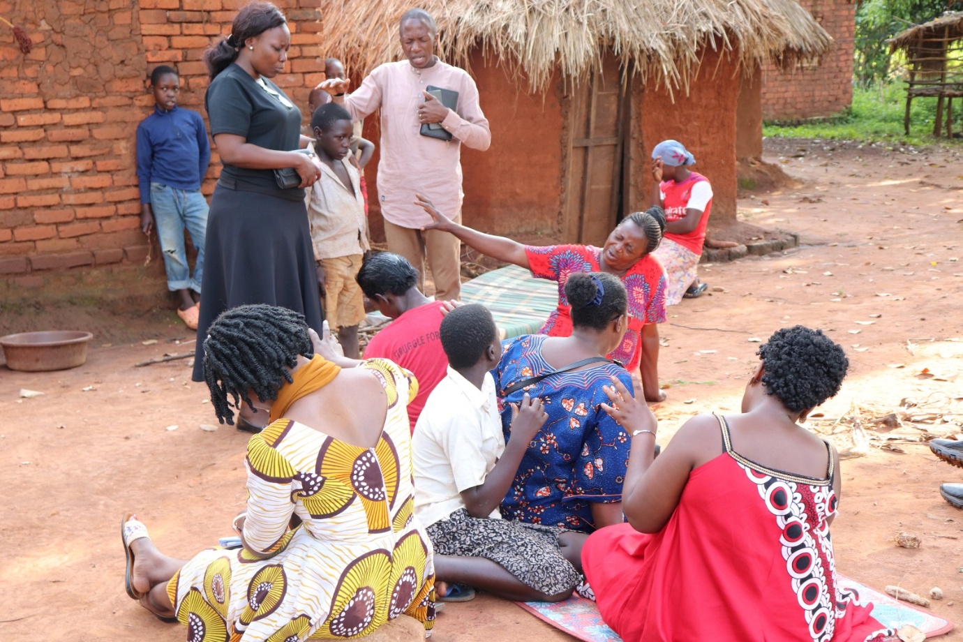 ENMI team members listening to women during a community visit