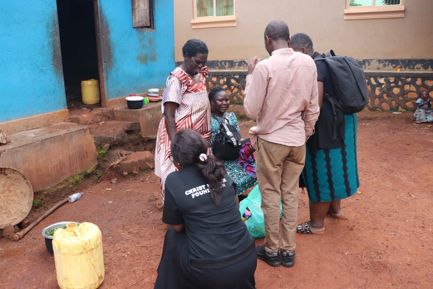 ENMI team members visiting a household in Uganda